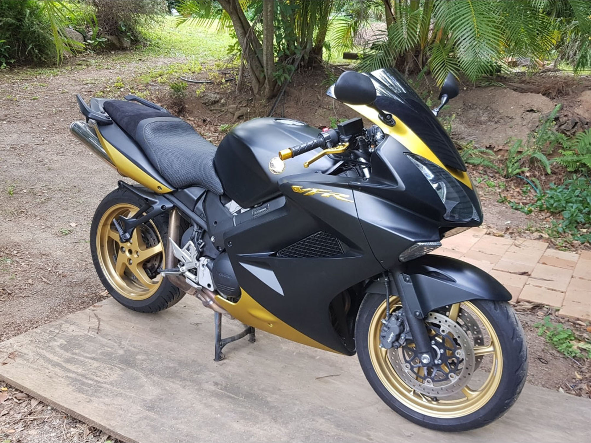 I rebuilt a written off Honda VFR800 with a totalled fairing. Delivery was prompt and the matt black and gold custom paint job was well executed. Every part i could ever want was included with the fairing, and securely packaged. The internal lugs are fully moulded, not glued on and the fit is exact to the frame of my bike. Plenty of fixings supplied. I have enjoyed so many compliments for this bike wherever I go and I wouldn't hesitate to buy another fairing if I did another bike rebuild. You can see from the photo how good the finished bike looks.